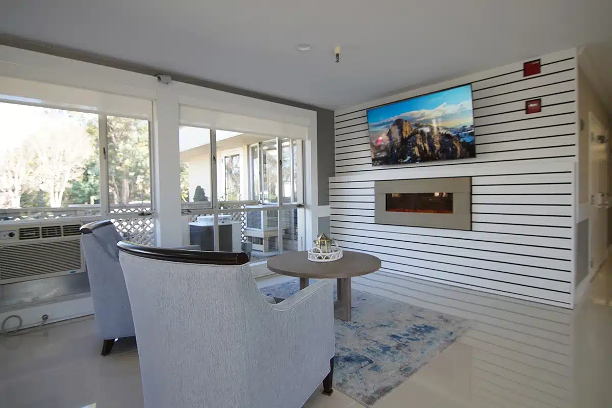 Two chairs facing a TV at Marin Post Acute